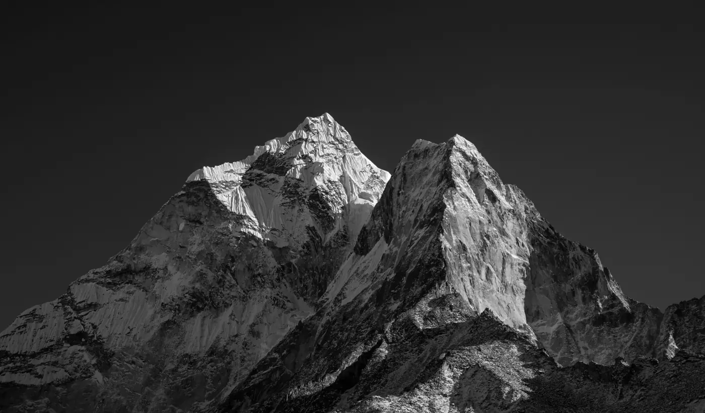 Steep twin summits in black and white